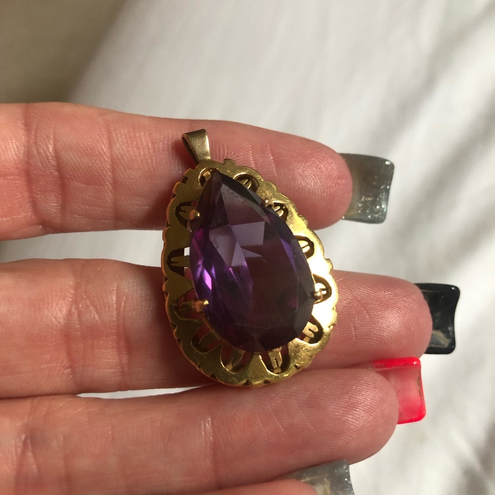 Custom Made Amethyst Pendant  set an 18 karat gold